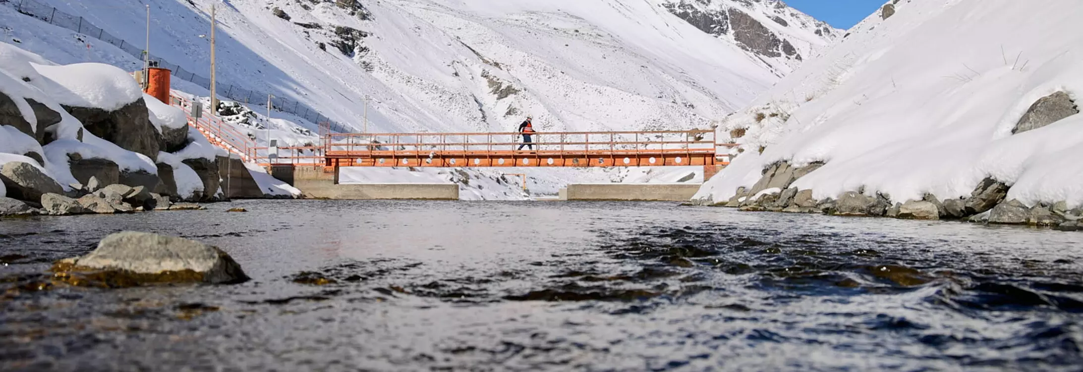 worker in an orange bridge