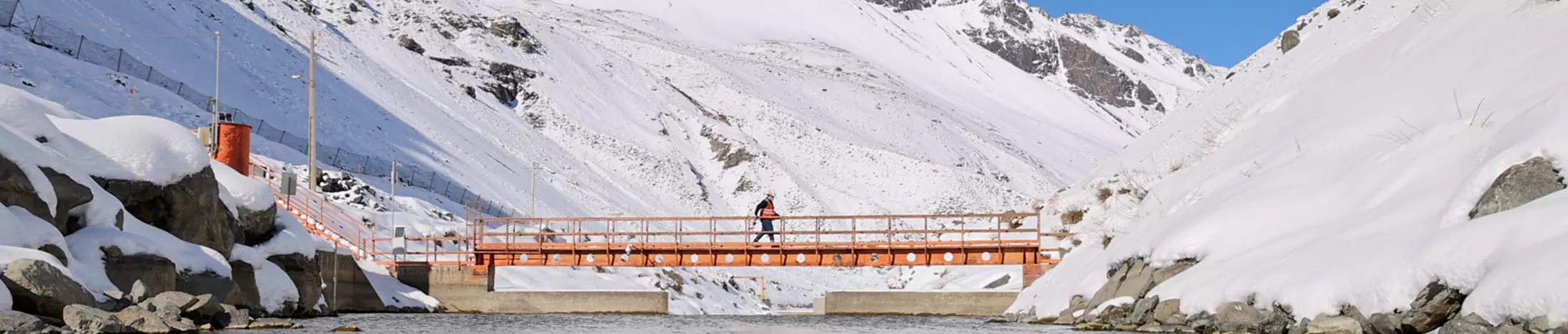 Worker on an orange bridge