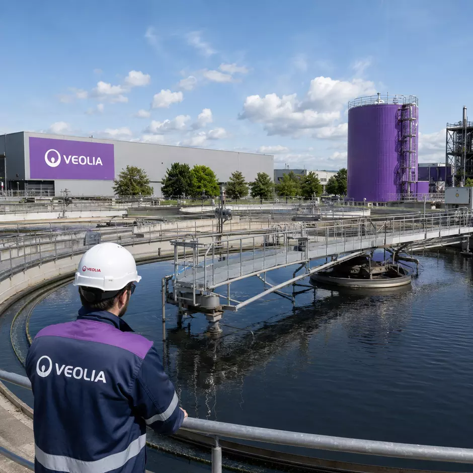 Veolia worker at a purple-themed water treatment plant